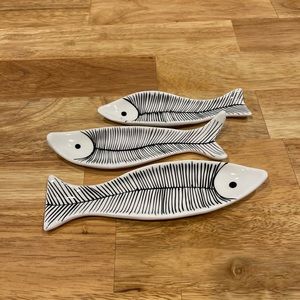 Small white porcelain fish dishes.  Set of three.